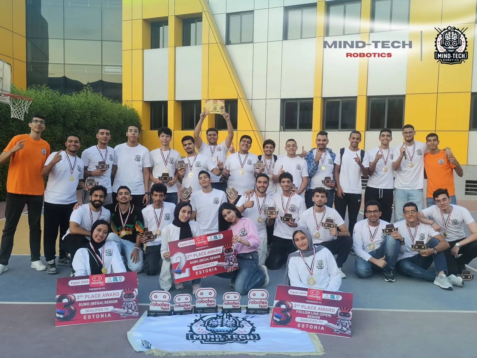 The team with medals and award boards at Robotex Egypt 2025