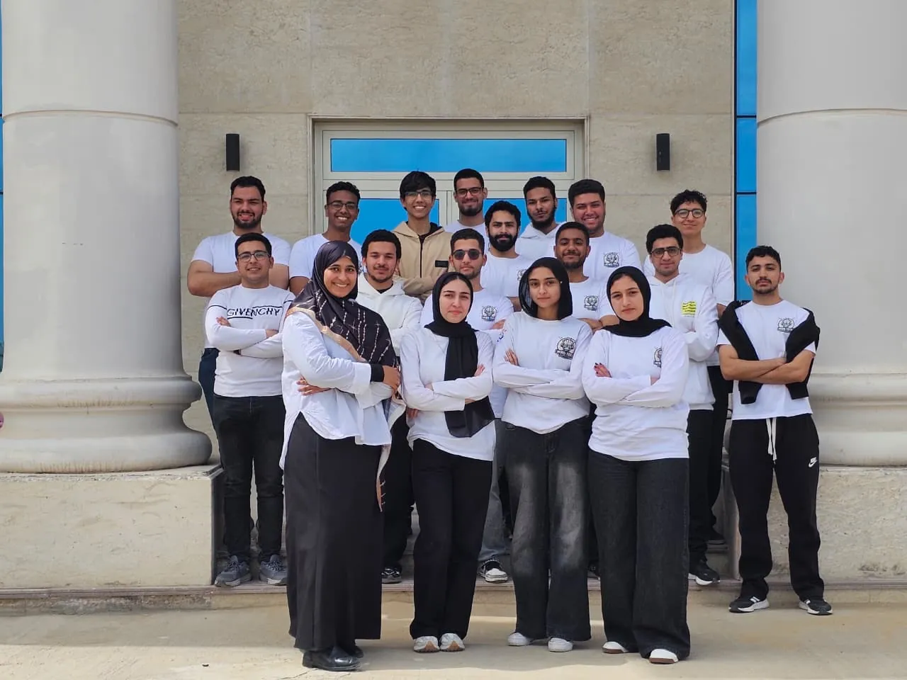 Mind-Tech Robotics members in team shirts